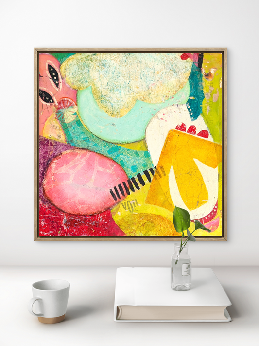 Abstract painting titled The Only Way Is Up by Jen Rodger featuring vibrant pink, yellow and aqua tones with textured layers symbolising optimism, trust and creative momentum. Pictured above a desk with a coffee cup and book.