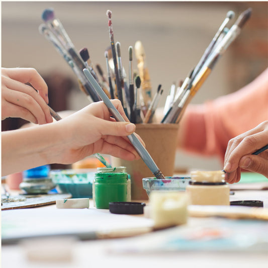 Mixed media tools for abstract painting — brushes, paint, palette knives, inks and papers